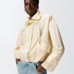 Ελαφρύ μπουφάν με μικρά τρουκς σε όλη την επιφάνεια - Creamy-White